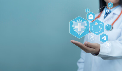 Female doctor in white coat with digital medical interface with health icons, stethoscope, pills and heartbeat symbol, representing health checkup, health insurance and modern healthcare system.