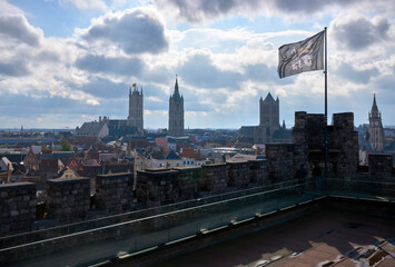 City of Ghent Flag Gravensteen Castle. A high angle view of historical Ghent and the City of Ghent Flag from the Castle of the Counts, Ghent, Flanders, Belgium.
