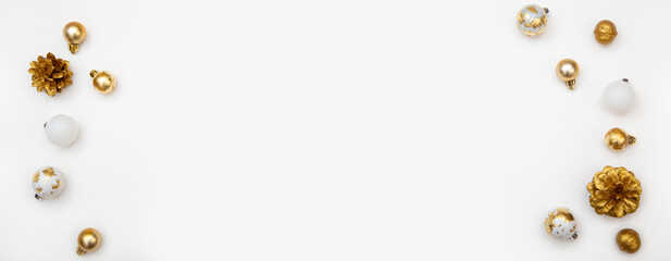 Modern New Year background in white and gold tones. Decorations on the sides form a frame and leave free copy space in the center.