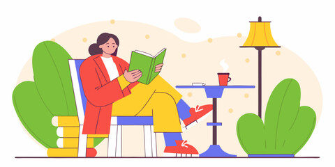 Stylish woman reading a book at a caf&eacute;, relaxed urban lifestyle.