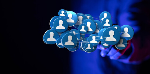 Concept of social network and global connections, depicted through floating user profile icons connected by lines and touched by a hand, represe