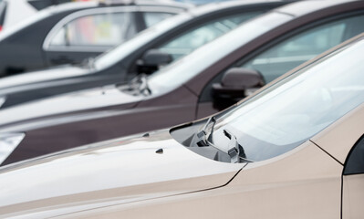 Fototapeta premium many cars parked in a row.
