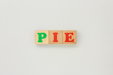 Wooden Toys Forming the Word Pie