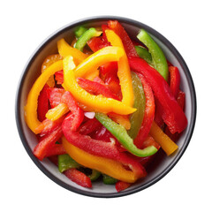 An overhead view of a dark bowl filled with vibrant sliced red yellow and green sweet peppers against a solid black backdrop