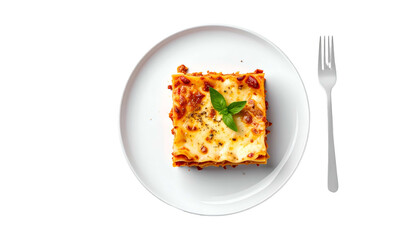 Overhead shot of a lasagna square on a white plate next to a fork, with a black background