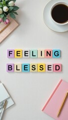 Colorful Letter Blocks Forming the Phrase Feeling Blessed on Table