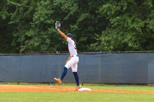 First Baseman Catching a Throw