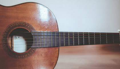 A room with a vintage classical guitar