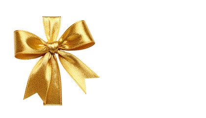 Golden bow. Richly textured gold bow, tightly knotted, resting against a completely black background, filling the left side