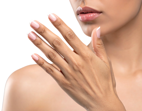 Close-up of a hand with elegant French manicure against a dark background, focus on skin and well-groomed nails