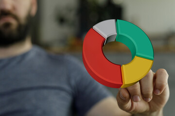 A person holding a 3D pie chart, a visual representation of financial data, concept of business, planning and strategy