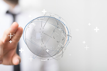 Abstract image of a person holding a digital globe concept. Illustrating connection, global...
