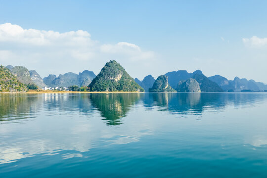 Quyang Lake (Quyanghu)  karst peaks landscape reflection in water in Baise city, Guangxi province, China