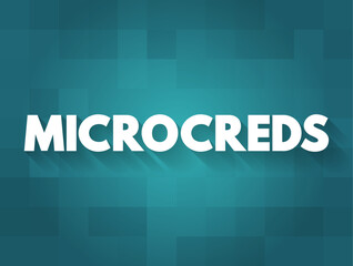 MICROCREDS text in bold capital letters on background. Concept for microcredentials, education, online learning, skills recognition, and digital certification