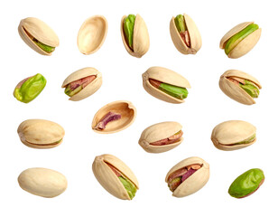 Obraz premium Scattered pistachios with open shells showing green nuts against a black background, some whole, some split