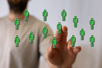 Abstract image showing networking, community and social connection. Human figures represent people...