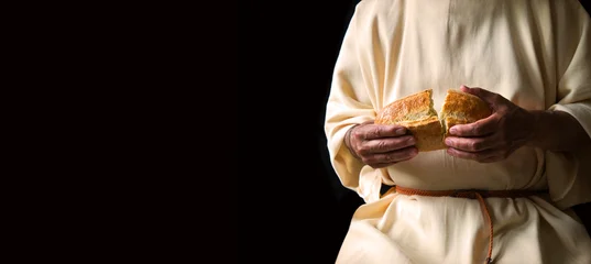 Fototapete Zu Essen Man's hans holding fresh bread  © Marina