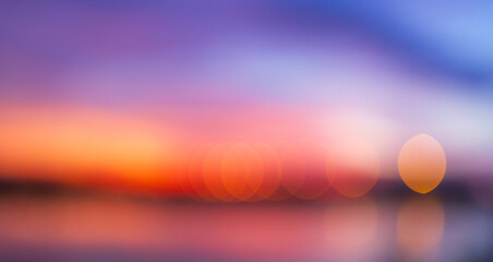 Clouds and sky background at sunrise in soft focus,Cloud sky sunrise during morning background. Blue pastel heaven,soft focus lens flare sunlight. Abstract blurred white cyan gradient of peaceful.