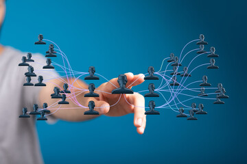 Abstract concept of teamwork, network, connection, communication and social media. Hand pointing at a digital network of people on a blue backgr