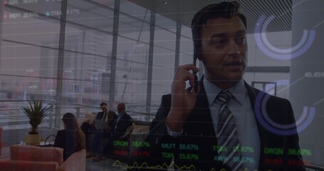 Businessman speaking on smartphone in office lounge with modern sofas and data overlays, copy space