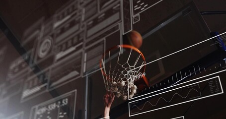 Leaping basketball athlete gripping rim and dunking ball on court, showing floating digital panels