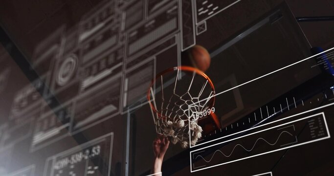 Leaping basketball athlete gripping rim and dunking ball on court, showing floating digital panels