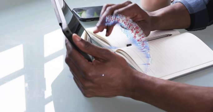 Man placing tablet in folio stand by window activating technology rotating AR globe points swirling