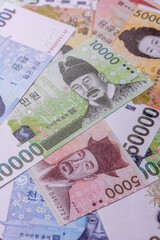 Korean paper money, won, and cash banknotes for financial transactions. Korean money