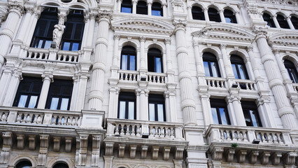 Fototapeta premium The streets of Trieste with the facades of old and colorful Mediterranean houses. Trieste, Italy