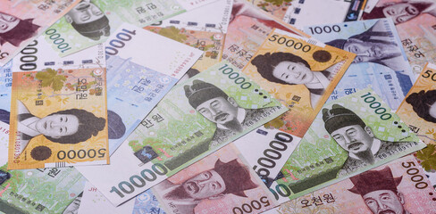 Korean paper money, won, and cash banknotes for financial transactions. Korean money
