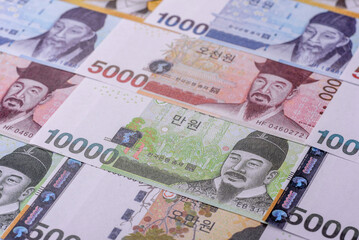 Korean paper money, won, and cash banknotes for financial transactions. Korean money