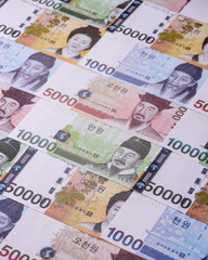 Korean paper money, won, and cash banknotes for financial transactions. Korean money