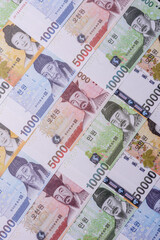 Korean paper money, won, and cash banknotes for financial transactions. Korean money