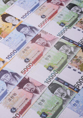 Korean paper money, won, and cash banknotes for financial transactions. Korean money