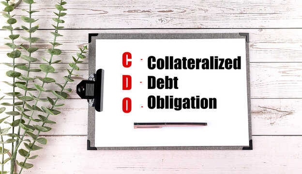 A word CDO Collateralized debt obligation written on clipboard on a white background. Business concept