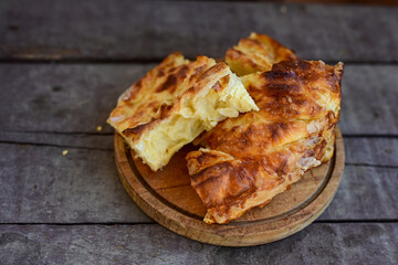 Typical bulgarian food .Home made  cheese pie  with phyllo pastry and organic eggs. Bulgarian banitsa