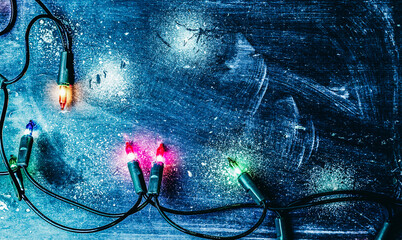 christmas lights over dark blue background
