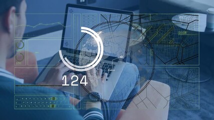 Man typing on laptop, initiating holographic tech demo with globe and charts tracking value changes - Powered by Adobe