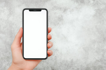 Hand Holding Smartphone on White Background