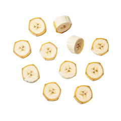 Sliced yellow bananas on a stark black background