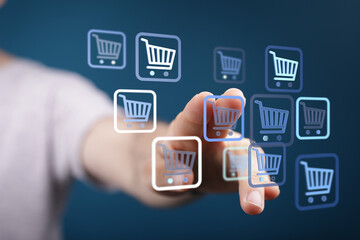 Person's finger interacting with shopping cart icons, representing online shopping, e-commerce, and digital purchasing. Perfect for marketing an