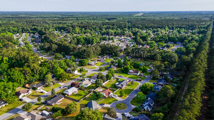 Aerial landscape of Richmond Hill residential area sunny summer day in Bryan County Georgia © Andrew