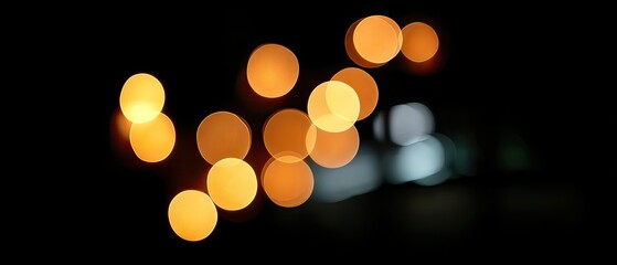 Obraz premium Bright and colorful bokeh lights fill the scene, enhancing the festive mood with a mix of warm and cool tones during the evening