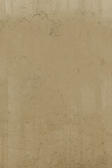 A solid colored background with a distinct, uneven texture