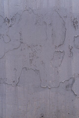 A solid colored background with a distinct, uneven texture