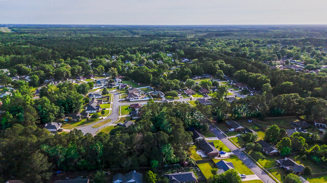 Aerial landscape of Richmond Hill residential area sunny summer day in Bryan County Georgia