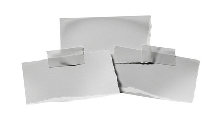 Torn paper pieces taped together, arranged on a black background