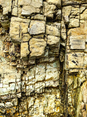 The formation of sedimentary rock layers in nature, formed from the accumulation of sand, mud, gravel and organic materials that settle and harden on the earth's surface.