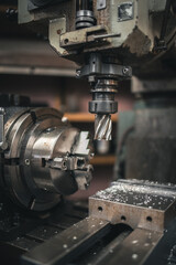 Digital mill being setup for precision manufacturing process in small workshop, West Sussex, UK