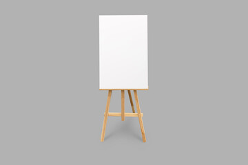 A front view of a wooden easel with a blank white canvas ready for painting or artistic creation use. Blank canvas on a brown wooden easel mockup isolated on a grey background.3d rendering.